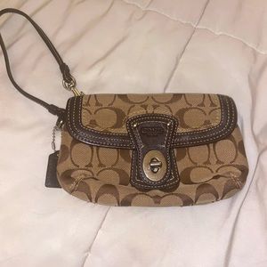 Coach Signature Legacy wristlet